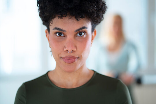 Portrait of a woman with curly hair