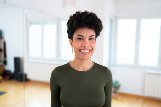 Smiling person in bright indoor space