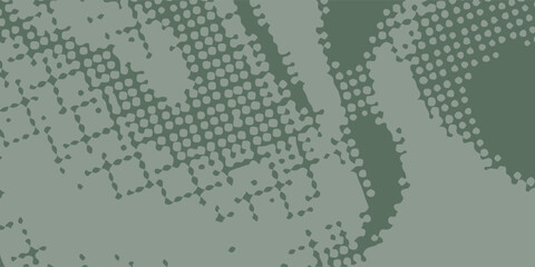 Obraz premium Abstract green halftone background with distressed dots and organic shapes. Sage and olive vector texture for military style posters, eco-friendly banners, and urban graphic design.