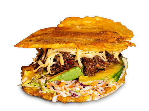 empanada, Venezuelan, fried, avocado sauce, guasacaca, appetizer, snack, golden, crispy, circle arrangement, dough, stuffed, homemade, traditional, Latin American, cuisine, street food, bowl, green sa