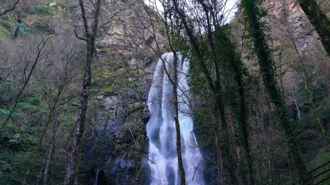 Idyllic Scenery Of Seimeira de Vilagocende Waterfall In O Fito, A Fonsagrada, Spain - Drone Shot