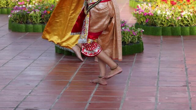 Traditional Thai Khon Dancers Perform Classical Footwork at Wat Suthat Temple