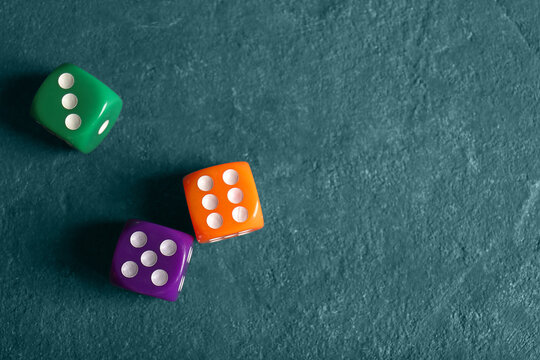 Different dices on color background