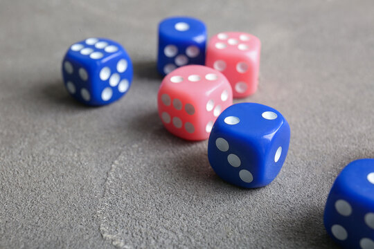 Different dices on grey background