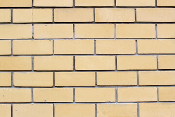 Obraz premium Texture of yellow brick wall.