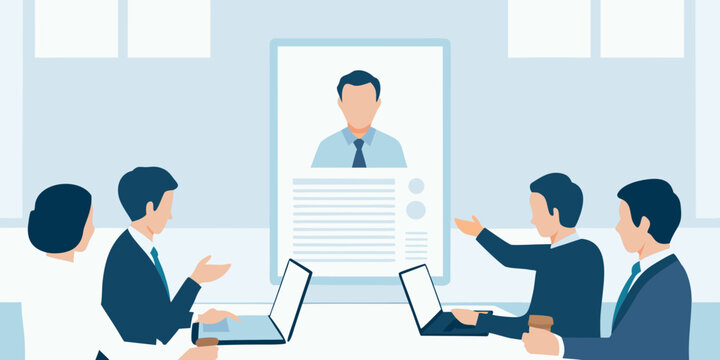 Business team conducts a video conference with a professional on screen