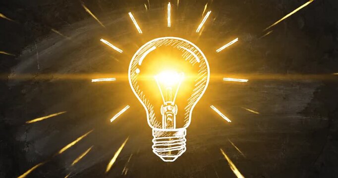 Glowing Light Bulb with Yellow Rays.