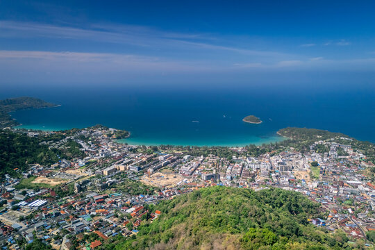 Sweeping aerial panorama captures Kata Beach and Kata Noi Beach in Phuket, Thailand