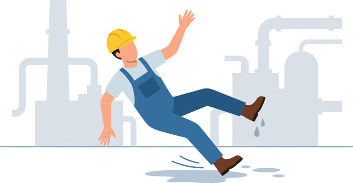A worker slips and falls on an industrial floor in a factory.