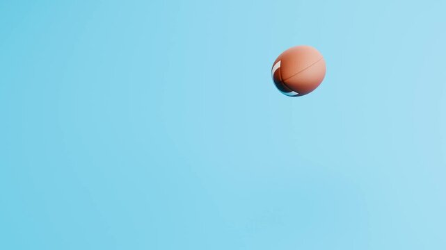 American Football Ball Bouncing on Blue Background with Copy Space, Seamless Loop 3D Animation
