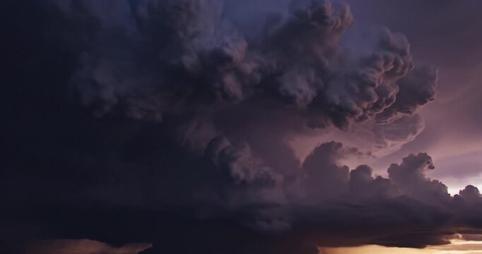 Dramatic Lightning Strike Within A Supercell Storm Cloud At Sunset