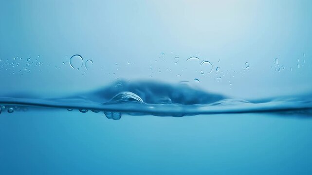 Split level view of blue immersion cooling liquid with splashing waves and rising air bubbles