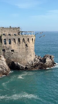 Torre Normanna ancient watchtower on the seafront of Maiori, Amalfi Coast, Salerno, Campania, Italy
