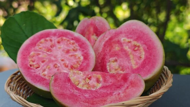 pink guava in a basket