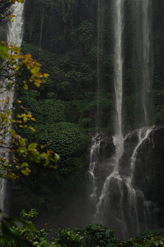 Sekumpul Waterfall Cascading Through Lush Tropical Jungle in Bali
