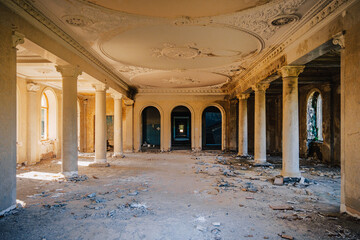 Obraz premium Abandoned ballroom of Sanatorium Iveria, Tskaltubo, Georgia — ornate ceilings and Soviet-era grandeur fading into silence.
