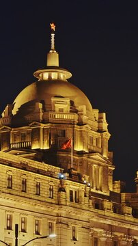 Shanghai, China. Clock tower of Shanghai, soaring beautifully at night. The Bund, Shanghai Custom House Building, The Clock Tower