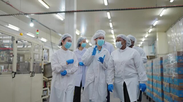 Factory Inspection Team: A team of skilled professionals, all clad in protective attire and masks, conducts a thorough factory inspection.