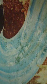 fierce deity mural, showcasing intricate details and vivid colors in a temple. Raja, king. Unawatuna, Sri Lanka. Yatagala RajaMaha Viharaya ancient Buddhist temple.