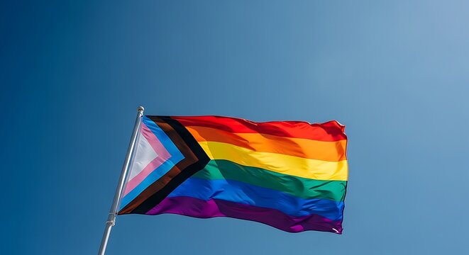 Rainbow flag waving proudly against a clear sky backdrop illustration