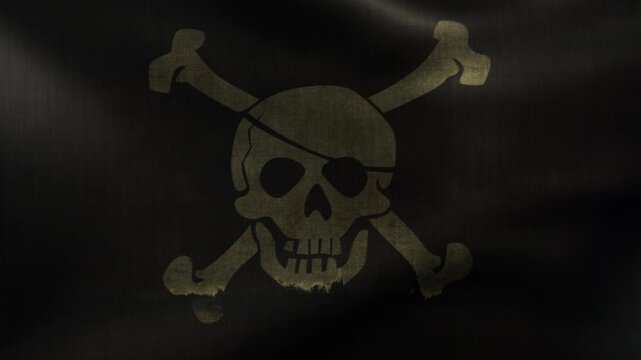 A worn pirate flag featuring a skull and crossbones on fluttering fabric