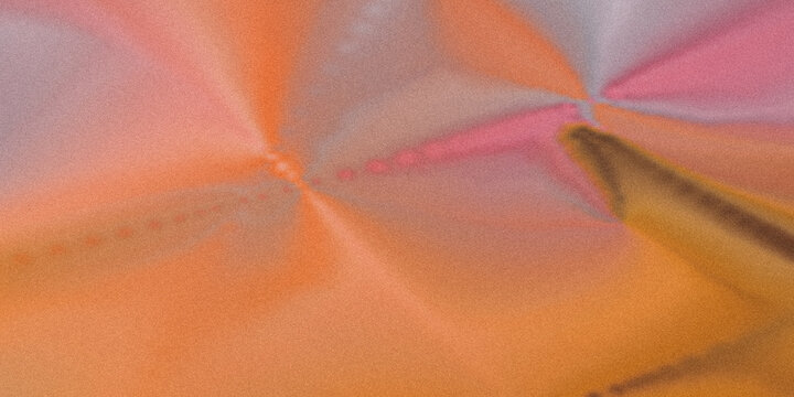 A pixelated image of an orange and pink fabric