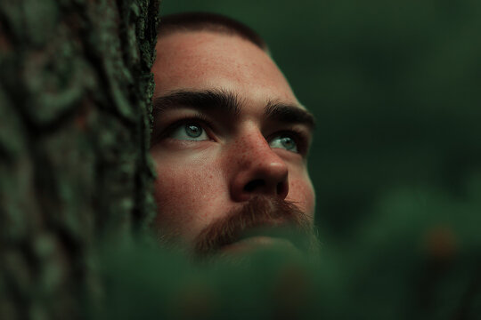 person standing at edge of cliff contemplating vast unknown before them