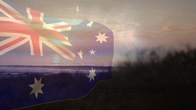Translucent flag entering left, rippling across coastal horizon, overlaying sun glint for branding