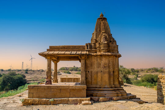 Ancient Sandstone Hindu Temple at Bada Bagh with Wind Turbines in Background, Jaisalmer, Rajasthan, India