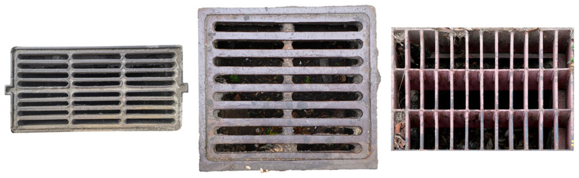 Three weathered metal drain covers or grates, showcasing diverse patterns and textures.