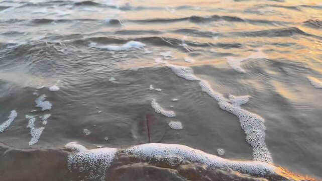 	Beautiful 4K view of Aare Ware Beach waves rolling onto the shore. Crystal waters, golden sand, coastal breeze, and scenic Konkan beauty create a peaceful and mesmerizing scene.