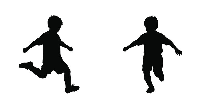 Two young boys playing soccer with balls in a dynamic black silhouette