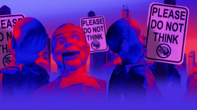 A group of faceless spinning mannequins and political statements contained on street signs on an endless loop.
