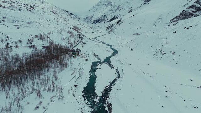 Beautiful shot of sissu village in lahaul valley covered in snow.
