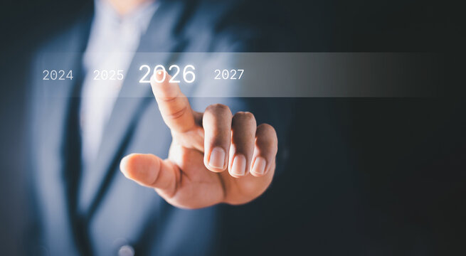 2026 business planning and innovation concept entrepreneur selecting future year on virtual interface representing strategy, transformation, data growth, Digital success in modern global economy 