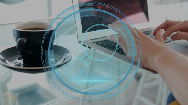 Hands with pale-yellow sleeve typing on silver laptop on glass table with Cyber Security HUD