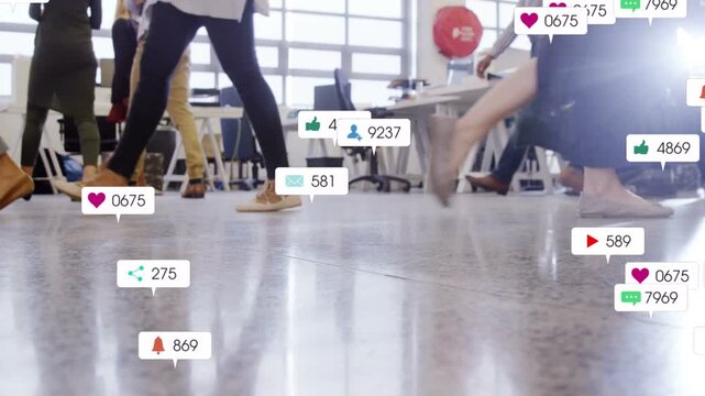 Business team walking across floor, sparking social icons around feet and tracking engagement rise