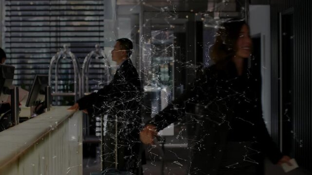 Woman arriving desk, checking in, staff handing card, she pulling case, man arriving, nodes pulsing