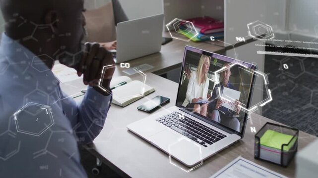 Vertical video: Man watching laptop remote lifting paper sparking hex code overlays for IT analysis