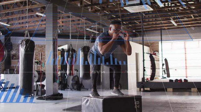 Male trainee shifting, repeating steps, stepping onto box, balancing as health graph tracking power