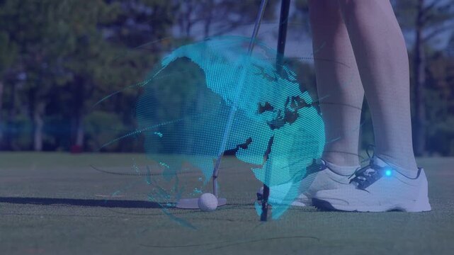 Female golfer aligning putter shifting weight and hitting ball as teal globe wrapping club for golf