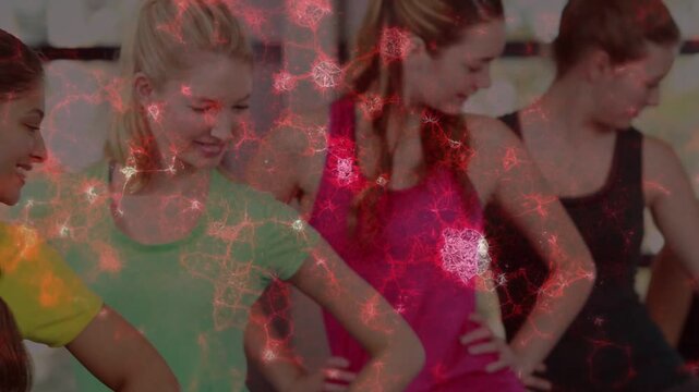 Women on blue balls, camera zooming to braided woman in yellow smiling fitness red overlay