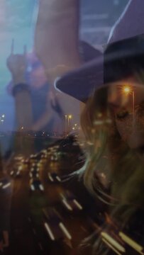 Vocalist starting song fan with wide hat turning raising dancing to music under road overlaying fan