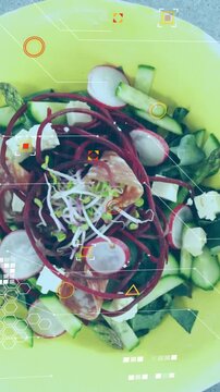 Vertical video: Camera straightening, AR overlay appearing, yellow bowl centering, salad clarifying