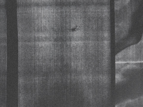 Photocopies of a black and white sheet of paper with a background or texture with grain and noise illustration