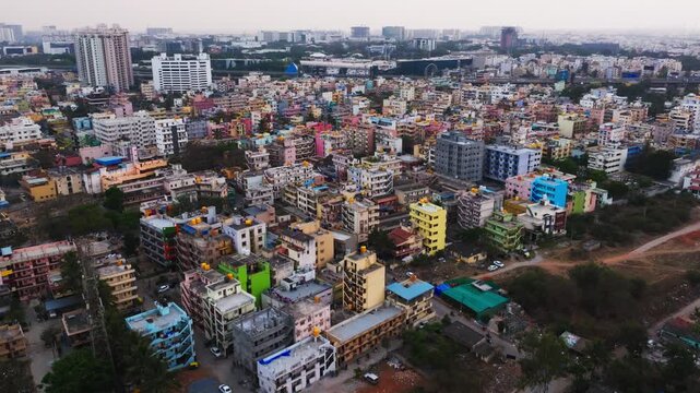 Residential buildings with tower buildings, signal tower and Infosys at Silicon town, Electronic city, Bengaluru, india. day time, zib shot, drone shot, 4k.