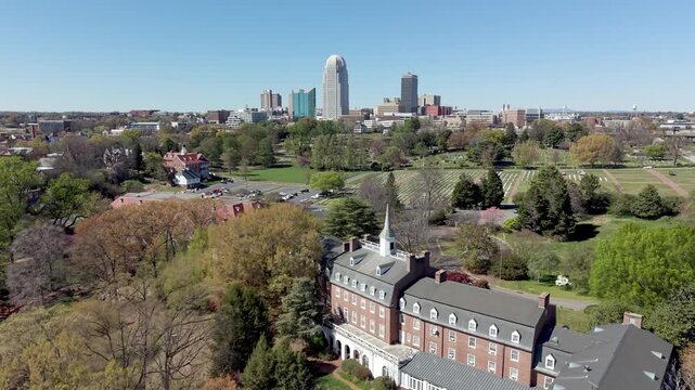 aerial push over salem college and god's acre in old salem and winston salem nc, north carolina