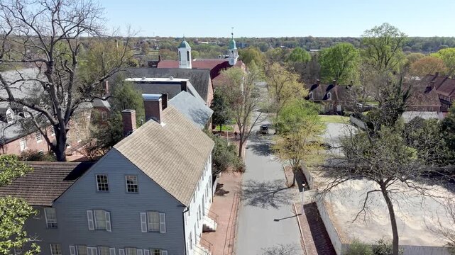 aerial push in toward home moravian church in old salem in winston salem nc, north carolina in spring