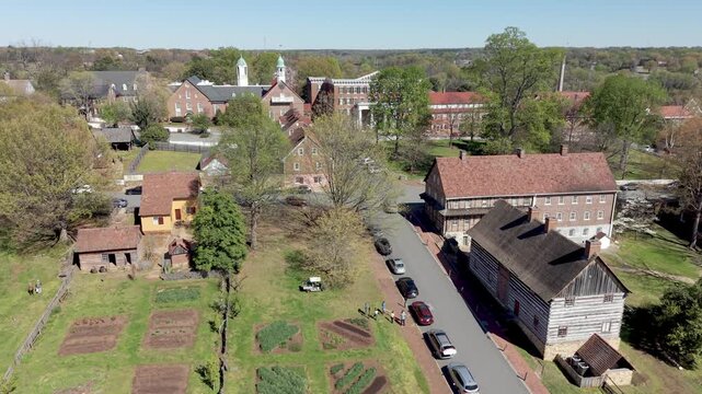 aerial push in to old salem nc, north carolina over garden space