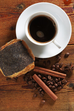 Black coffee with poppy pastry